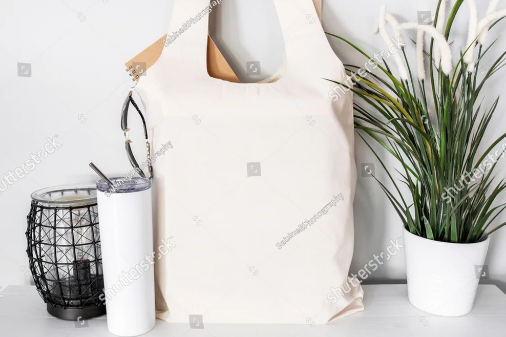 Medium canvas tote bag on table with sunglasses and tumbler, mother’s day purse Mockup
